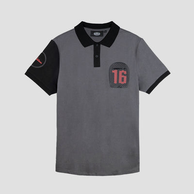 A short-sleeved grey polo shirt with a collar, featuring a large embroidered logo on the front and a subtle graphic on the back. The shirt is made from 100% cotton.