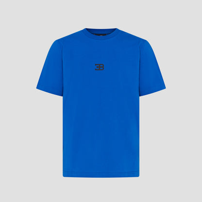 A blue crew neck t-shirt with a small embroidered logo on the chest.